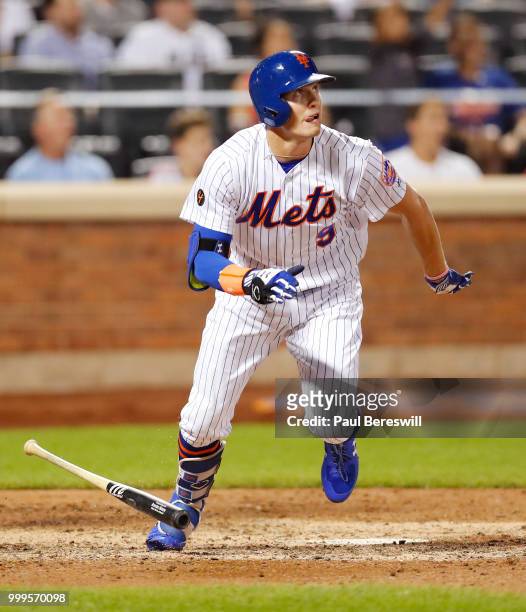 Brandon Nimmo of the New York Mets hits a game winning walk off home run in the 10th inning in an MLB baseball game against the Philadelphia Phillies...