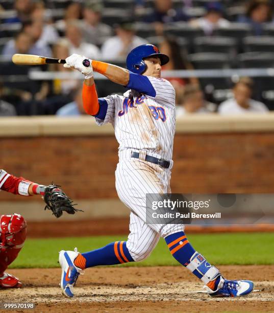 Michael Conforto of the New York Mets bats in an MLB baseball game against the Philadelphia Phillies on July 11, 2018 at Citi Field in the Queens...