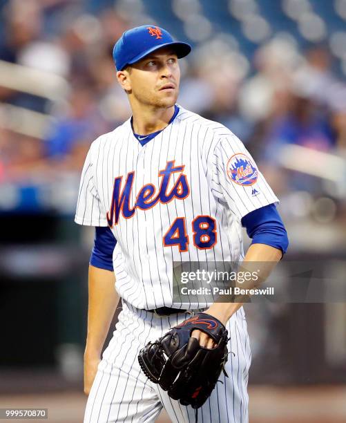 Pitcher Jacob deGrom of the New York Mets reacts in an MLB baseball game against the Philadelphia Phillies on July 11, 2018 at Citi Field in the...