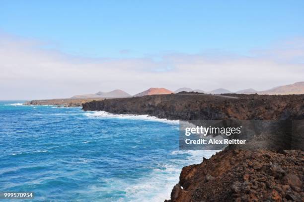 rough lava coast of spanish volcanic island lanzar - lanzar stock pictures, royalty-free photos & images