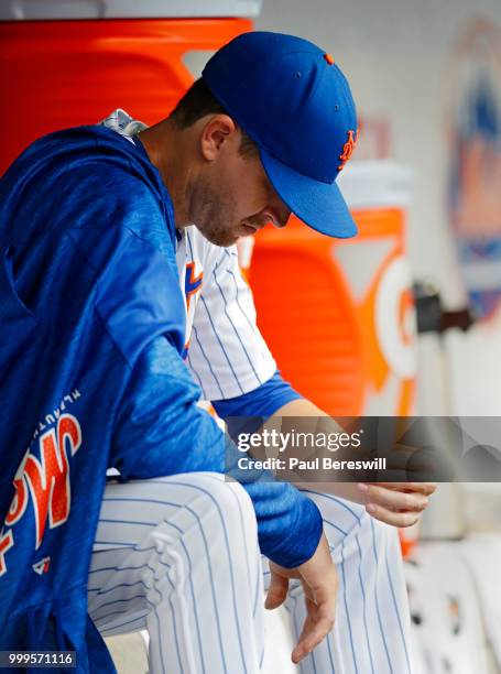 Pitcher Jacob deGrom of the New York Mets sits in the dugout during an MLB baseball game against the Philadelphia Phillies on July 11, 2018 at Citi...