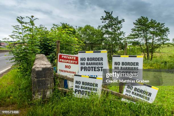 european border between the republic of ireland and northern ireland, which could become a hard border after the brexite negotiations between the eu and great britain, blacklion, county cavan, ireland - brexit travel stock pictures, royalty-free photos & images