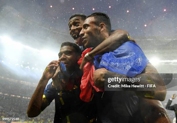 Presnel Kimpembe, Thomas Lemar, and Corentin Tolisso of France celebrate following their sides victory in the 2018 FIFA World Cup Final between...