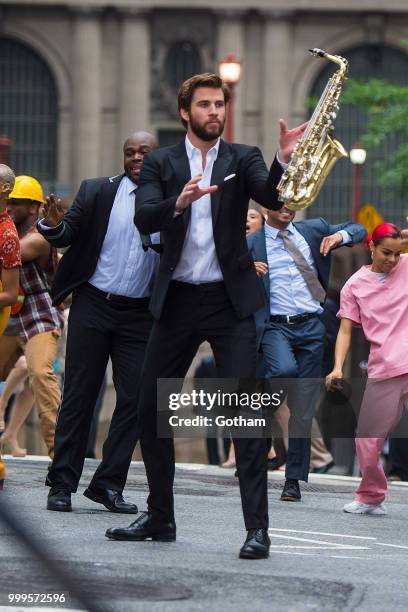 Liam Hemsworth is seen filming a scene for 'Isn't It Romantic?' in Midtown on July 15, 2018 in New York City.