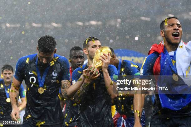 Lucas Hernandez of France celebrates with the World Cup Trophy following his sides victory in the 2018 FIFA World Cup Final between France and...