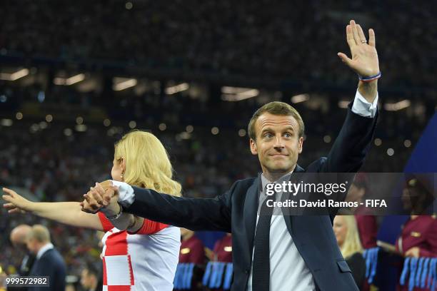 French President Emmanuel Macron and President of Croatia, Kolinda Grabar Kitarovic on the podium prior to the winners ceremony following the 2018...