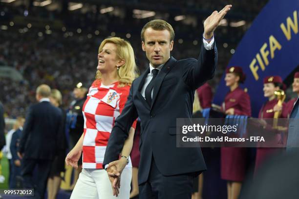 French President Emmanuel Macron and President of Croatia, Kolinda Grabar Kitarovic on the podium prior to the winners ceremony following the 2018...