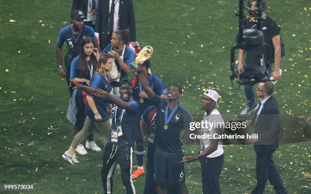 Paul Pogba of France celebrates with the World Cup Trophy following his sides victory in the 2018 FIFA World Cup Final between France and Croatia at...