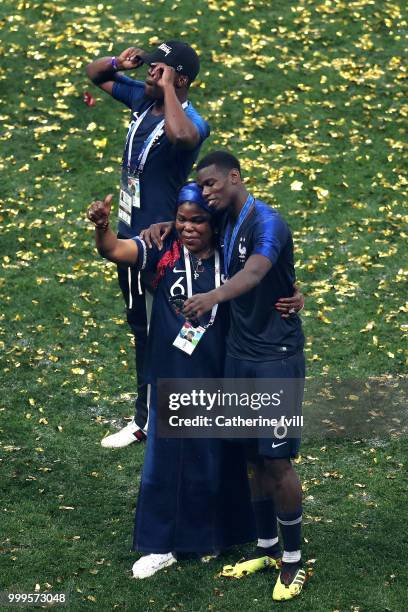 Paul Pogba of France celebrates with his mother, Yeo Pogba, following his sides victory in the 2018 FIFA World Cup Final between France and Croatia...