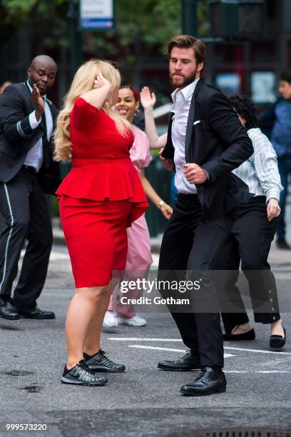 Rebel Wilson and Liam Hemsworth are seen filming a scene for 'Isn't It Romantic?' in Midtown on July 15, 2018 in New York City.