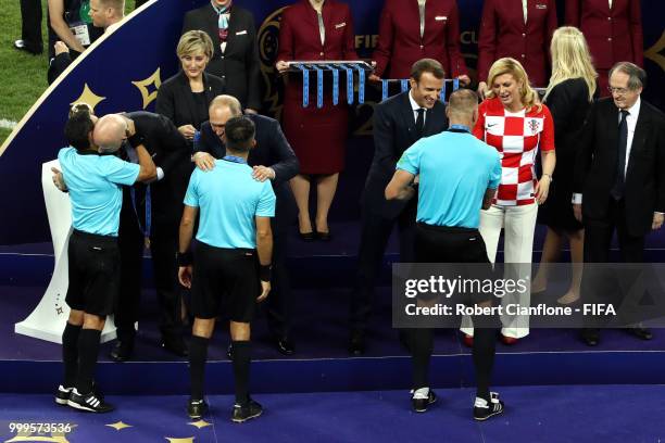 Match Referee Nestor Pitana and Assistant Referees Hernan Maidana and Juan Pablo Belatti receive their medalsls following the 2018 FIFA World Cup...