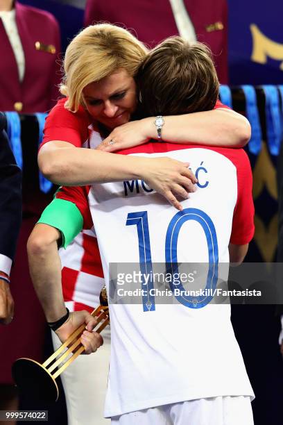 Luka Modric of Croatia embraces Kolinda Grabar-Kitarovic, President of Croatia after the 2018 FIFA World Cup Russia Final between France and Croatia...
