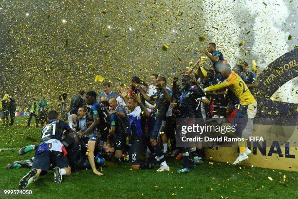 France pose with the trophy as they celebrate victory following the 2018 FIFA World Cup Final between France and Croatia at Luzhniki Stadium on July...