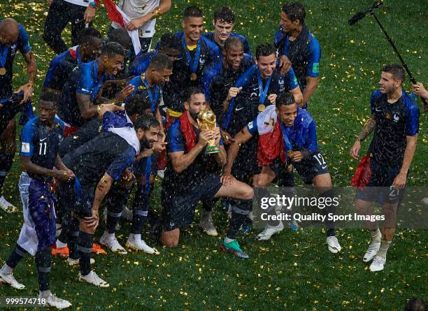 Adil Rami of France celebrates with the trophy with his teammates after the 2018 FIFA World Cup Russia Final between France and Croatia at Luzhniki...