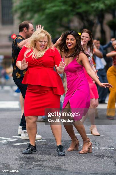 Rebel Wilson and Priyanka Chopra are seen filming a scene for 'Isn't It Romantic?' in Midtown on July 15, 2018 in New York City.