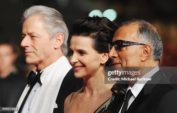 Director Abbas Kiarostami and actress Juliette Binoche with actor William Shimell attends the "Certified Copy" Premiere at the Palais des Festivals...