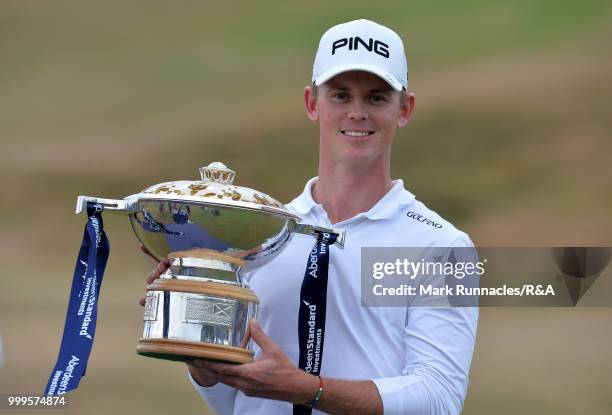 Brandon Stone of Republic of South Africa poses with the Scottish Open trophy after winning the tournament and qualifying for the Open at Carnoustie...