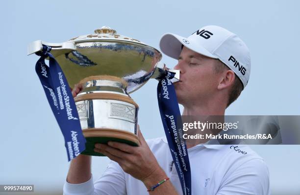 Brandon Stone of Republic of South Africa poses with the Scottish Open trophy after winning the tournament and qualifying for the Open at Carnoustie...