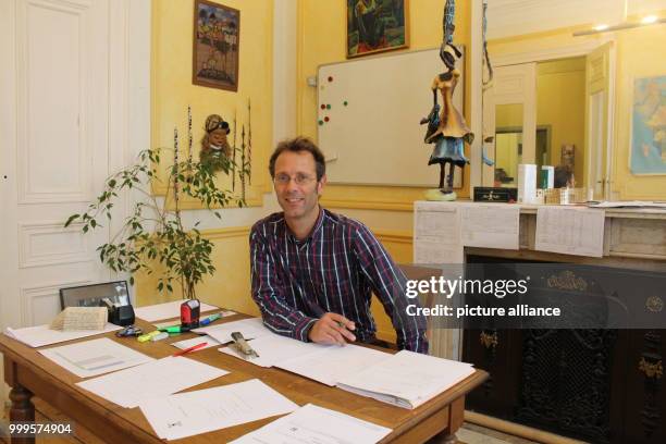 Thierry van Pevenage, director of the student hall "Maison Africaine" is sitting in his office in the quarter Matongé in Brussels, Belgium, 17 August...