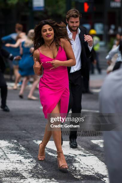 Liam Hemsworth and Priyanka Chopra are seen filming a scene for 'Isn't It Romantic?' in Midtown on July 15, 2018 in New York City.