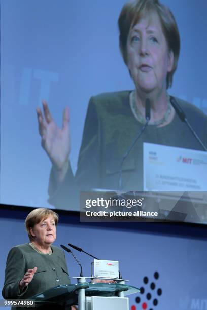 German Chancellor Angela Merkel is giving a speech at the small and medium-sized businesses coalition of CDU/CSU in Nuremberg, Germany, 01 September...