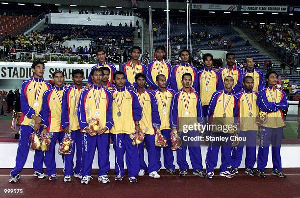 The Malaysian Team pose for photographs after the final match between Malaysia and Thailand held at the Shah Alam Stadium, Shah Alam, Selangor ,...