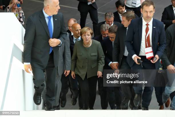 Dpatop - German Chancellor Angela Merkel arrives at the small and medium-sized businesses coalition of CDU/CSU in Nuremberg, Germany, 01 September...