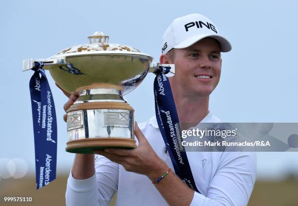 Brandon Stone of Republic of South Africa poses with the Scottish Open trophy after winning the tournament and qualifying for the Open at Carnoustie...