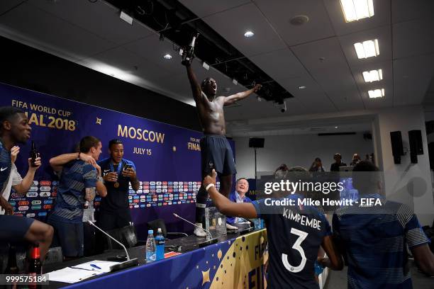 Benjamin Mendy of France celebrates with his teammates during the press conference following their sides victory in the 2018 FIFA World Cup Final...