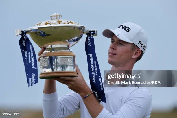 Brandon Stone of Republic of South Africa poses with the Scottish Open trophy after winning the tournament and qualifying for the Open at Carnoustie...