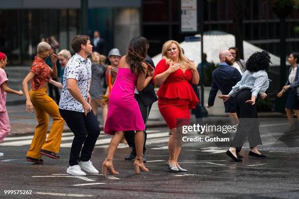 Adam Devine, Rebel Wilson and Priyanka Chopra are seen filming a scene for 'Isn't It Romantic?' in Midtown on July 15, 2018 in New York City.