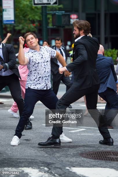 Adam Devine and Liam Hemsworth are seen filming a scene for 'Isn't It Romantic?' in Midtown on July 15, 2018 in New York City.