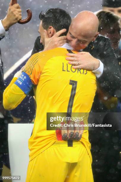 President Gianni Infantino hugs Hugo Lloris of France after the 2018 FIFA World Cup Russia Final between France and Croatia at Luzhniki Stadium on...