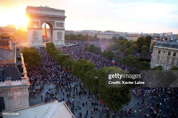 Unruly fans during celebrations of France's victory against Croatia in the 2018 FIFA World Cup final at Champs Elysee on July 15, 2018 in Paris,...