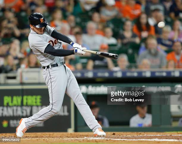 JaCoby Jones of the Detroit Tigers lines out to Josh Reddick of the Houston Astros in the third inning at Minute Maid Park on July 15, 2018 in...