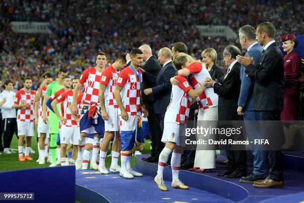 Croatia players are presented with their runners up medals following the 2018 FIFA World Cup Final between France and Croatia at Luzhniki Stadium on...