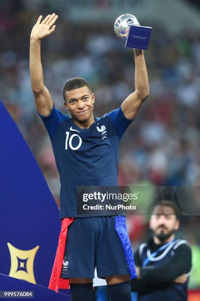 Kylian Mbappe celebrate victory with the FIFA World Cup trophy at the end of of the 2018 FIFA World Cup Russia Final between France and Croatia at...