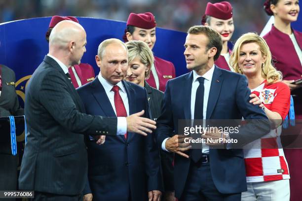 Gianni Infantino,Wladimir Putin,Emmanuel Macron Kolinda Grabar-Kitarovic at the end of of the 2018 FIFA World Cup Russia Final between France and...