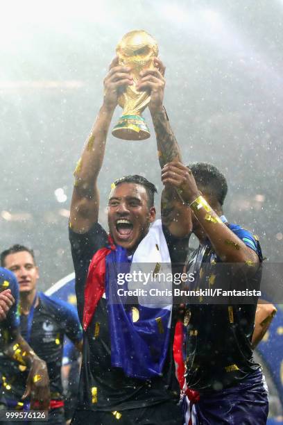 Corentin Tolisso of France celebrates with the World Cup trophy after the 2018 FIFA World Cup Russia Final between France and Croatia at Luzhniki...