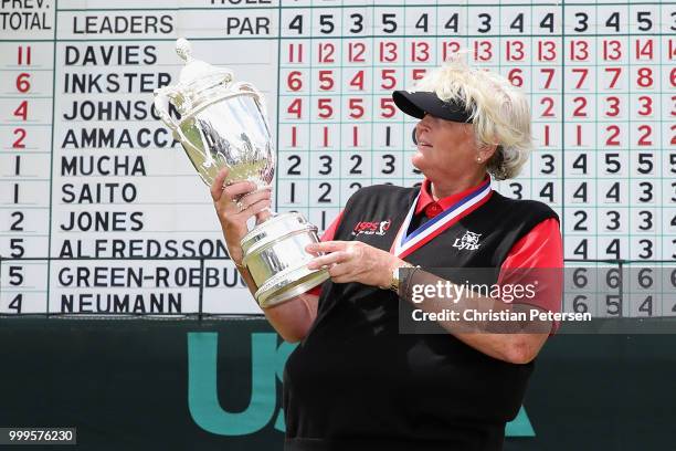 Laura Davies of England poses with the U.S. Senior Women's Open trophy after winning in the final round at Chicago Golf Club on July 15, 2018 in...