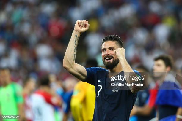 Olivier Giroud celebrate victory with the FIFA World Cup trophy at the end of of the 2018 FIFA World Cup Russia Final between France and Croatia at...