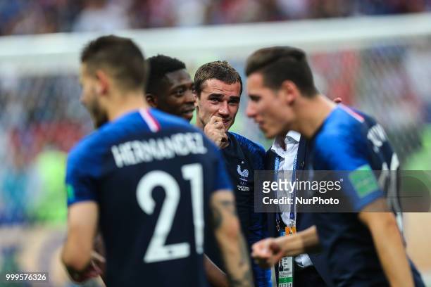 Antoine Griezmann celebrate victory with the FIFA World Cup trophy at the end of of the 2018 FIFA World Cup Russia Final between France and Croatia...