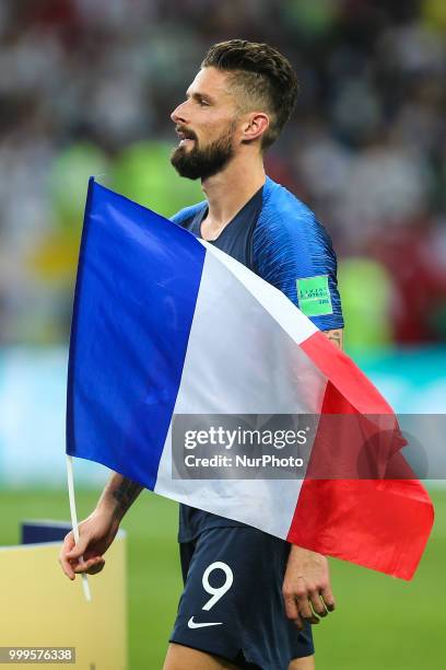 Olivier Giroud celebrate victory with the FIFA World Cup trophy at the end of of the 2018 FIFA World Cup Russia Final between France and Croatia at...