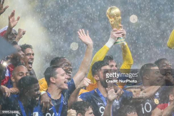 Hugo Lloris Olivier Giroud Kylian Mbappe celebrate victory with the FIFA World Cup trophy at the end of of the 2018 FIFA World Cup Russia Final...