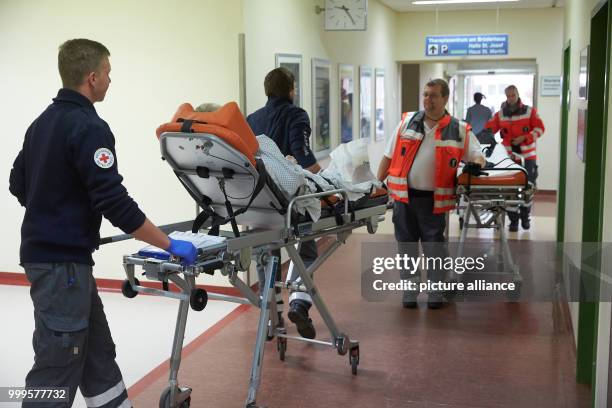 Employees of the emergency services evacuate patients from the Bruederkrankenhaus hospital in Koblenz, Germany, 02 September 2017. Some 21,000 local...