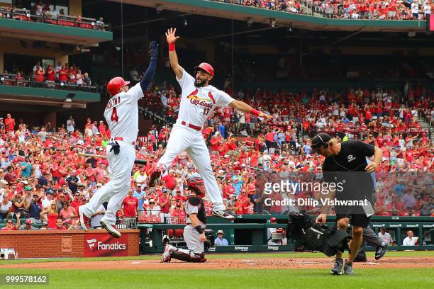 Matt Carpenter of the St. Louis Cardinals celebrates after hitting a home run against the Cincinnati Reds in the first inning at Busch Stadium on...