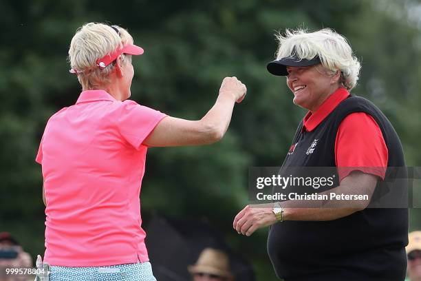 Laura Davies of England celebrates with Trish Johnson of England after winning the U.S. Senior Women's Open at Chicago Golf Club on July 15, 2018 in...