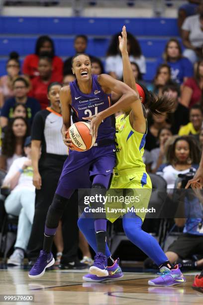 DeWanna Bonner of the Phoenix Mercury handles the ball against the Dallas Wings on July 10, 2018 at the College Park Center in Arlington, Texas. NOTE...