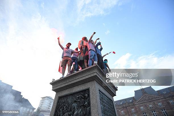 Peopler celebrate after France won the Russia 2018 World Cup final football match between France and Croatia, on July 15, 2018 in Strasbourg, eastern...