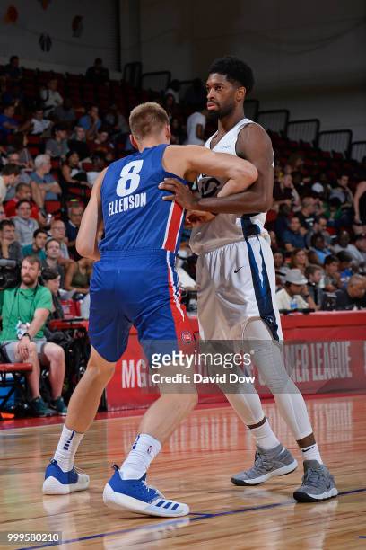 Henry Ellenson of the Detroit Pistons plays defense against Amile Jefferson of the Minnesota Timberwolves during the 2018 Las Vegas Summer League on...